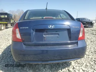 2006 Hyundai Accent GLS with VIN KMHCN46C56U042703, listed as a Copart auction lot 48938265 with 167,661 mi miles and Salvage Title. Bid and sale history available at carsss.com. Image 6.