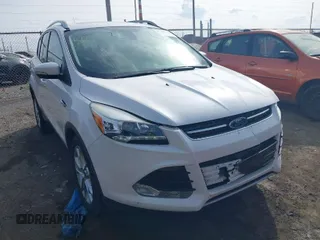 2015 Ford Escape Titanium with VIN 1FMCU9J98FUC76491, listed as a IAAI auction lot 41790638 with 158,196 mi miles and . Bid and sale history available at DreamBid. Image 1.