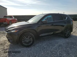 2019 Mazda CX-5 Touring with VIN JM3KFACM6K1562646, listed as a Copart auction lot 44153425 with 49,780 mi miles and Salvage Title. Bid and sale history available at carsss.com. Image 1.