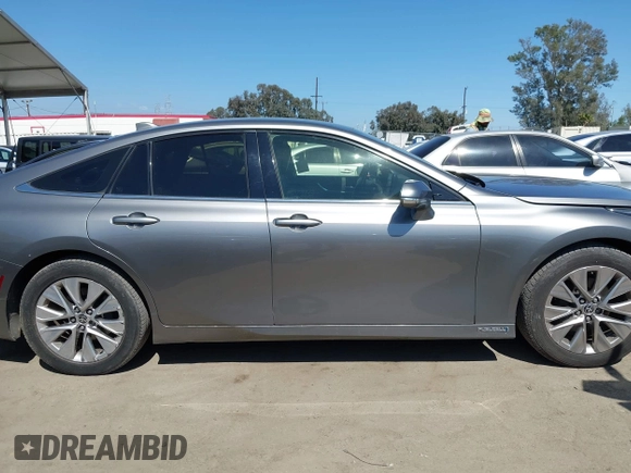 2021 Toyota Mirai XLE with VIN JTDAAAAAXMA002000, listed as a IAAI auction lot 42207752 with 33,017 mi miles and . Bid and sale history available at DreamBid. Image 14.