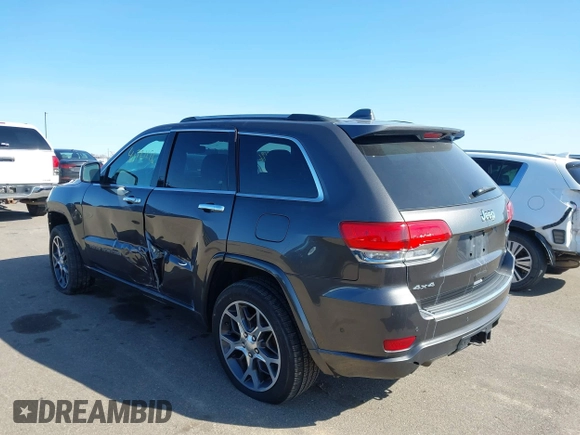 2019 Jeep Grand Cherokee Overland with VIN 1C4RJFCGXKC640377, listed as a IAAI auction lot 41721196 with 79,745 mi miles. Bid and sale history available at carsss.com. Image 3.
