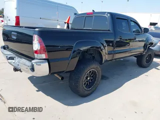 2014 Toyota Tacoma PreRunner with VIN 3TMKU4HN0EM040104, listed as a IAAI auction lot 41619179 with 171,542 mi miles and . Bid and sale history available at DreamBid. Image 4.
