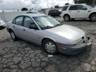 1996 Saturn SL with VIN 1G8ZH5288TZ156412, listed as a Copart auction lot 44429465 with 141,560 mi miles and Salvage Title. Bid and sale history available at carsss.com. Image 4.