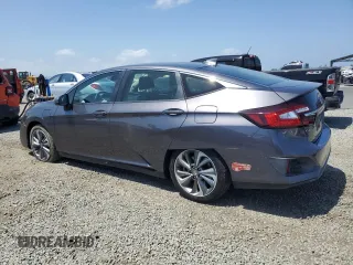 2018 Honda Clarity Touring z VIN JHMZC5F36JC014495, wystawiony jako Copart lot #56139675 z przebiegiem 75 020 mil mil oraz Szkoda całkowita • Salvage title. Historia ofert i sprzedaży dostępna na DreamBid. Obrazek 2.