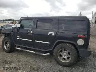 2003 Hummer H2 with VIN 5GRGN23UX3H121939, listed as a Copart auction lot 69503424 with 170,144 mi miles and Salvage Title. Bid and sale history available at carsss.com. Image 2.