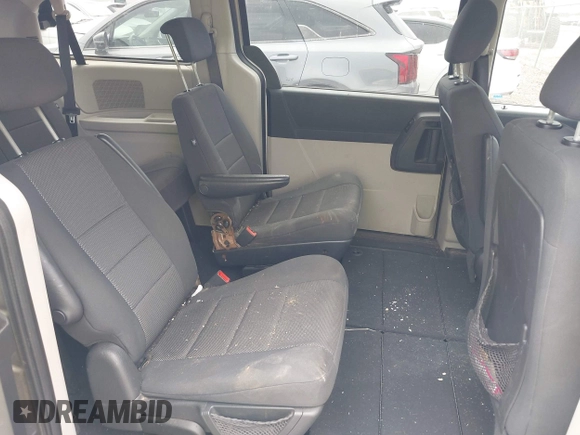2009 Dodge Grand Caravan SE z VIN 1D8HN44E99B509833, wystawiony jako IAAI lot #42277393 z przebiegiem Nie podano mil oraz . Historia ofert i sprzedaży dostępna na DreamBid. Obrazek 8.