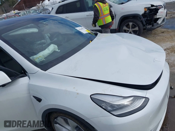 2022 Tesla Model Y Long Range with VIN 7SAYGDEE1NA013066, listed as a IAAI auction lot 41646912 with Not Provided miles and . Bid and sale history available at DreamBid. Image 6.