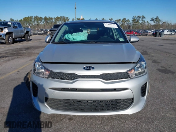2020 Kia Rio S with VIN 3KPA25AD7LE348113, listed as a IAAI auction lot 41365528 with 43,633 mi miles and . Bid and sale history available at DreamBid. Image 12.