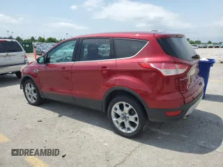 2013 Ford Escape SEL with VIN 1FMCU9H96DUD80433, listed as a Copart auction lot 55514195 with 195,781 mi miles and Salvage title. Bid and sale history available at DreamBid. Image 2.