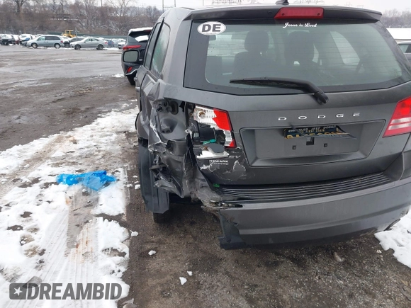2014 Dodge Journey SE with VIN 3C4PDCAB0ET182376, listed as a IAAI auction lot 41569006 with 106,024 mi miles and . Bid and sale history available at DreamBid. Image 17.