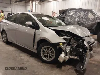 2018 Toyota Prius Two with VIN JTDKBRFU3J3582337, listed as a IAAI auction lot 40457335 with 166,690 mi miles. Bid and sale history available at carsss.com. Image 1.