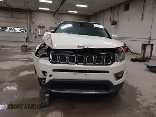 2021 Jeep Compass Limited with VIN 3C4NJCCB0MT576990, listed as a IAAI auction lot 41710809 with 77,903 mi miles. Bid and sale history available at carsss.com. Image 12.