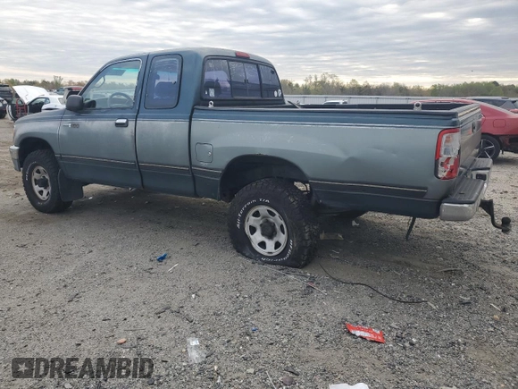 1995 Toyota T100 z VIN JT4VD22E9S0004095, wystawiony jako Copart lot #52683765 z przebiegiem 564 413 mil mil oraz Szkoda całkowita • Salvage title. Historia ofert i sprzedaży dostępna na DreamBid. Obrazek 2.