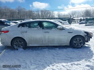 2017 Kia Optima LX 1.6T with VIN 5XXGT4L10HG129691, listed as a IAAI auction lot 41279304 with 93,087 mi miles. Bid and sale history available at carsss.com. Image 14.