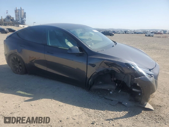 2024 Tesla Model Y с VIN 7SAYGDED2RF100152, выставлен на аукционе Copart как лот 52133535 с пробегом 7 632 миль миль и Списание • Salvage title. История ставок и продаж доступна на DreamBid. Изображение 4.