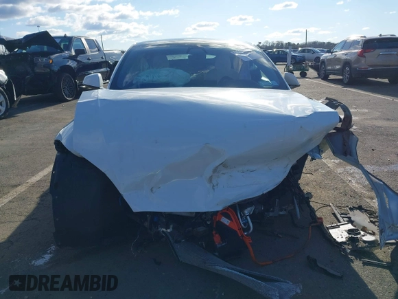 2022 Tesla Model S with VIN 5YJSA1E51NF491493, listed as a IAAI auction lot 41570494 with Not Provided miles and . Bid and sale history available at DreamBid. Image 12.