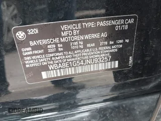 2018 BMW 3 Series 320i with VIN WBA8E1G54JNU93257, listed as a IAAI auction lot 41719141 with 144,381 mi miles. Bid and sale history available at carsss.com. Image 9.