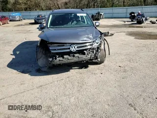 2016 Volkswagen Tiguan S with VIN WVGBV7AX0GW524346, listed as a Copart auction lot 87221564 with 163,609 mi miles and Salvage Title. Bid and sale history available at DreamBid. Image 11.