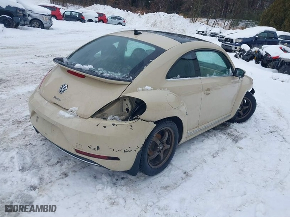 2019 Volkswagen Beetle S with VIN 3VWFD7AT1KM703684, listed as a IAAI auction lot 41571691 with 111,180 mi miles. Bid and sale history available at carsss.com. Image 4.