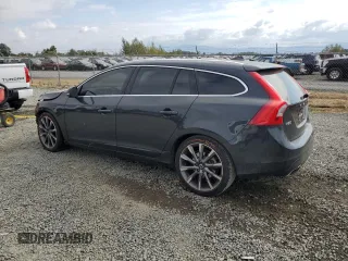 2015 Volvo V60 T5 Drive-E Premier with VIN YV140MEKXF1259241, listed as a Copart auction lot 66890004 with 117,600 mi miles and Salvage Title. Bid and sale history available at carsss.com. Image 2.