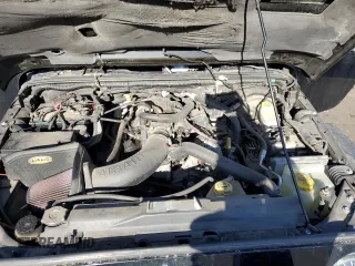 2009 Jeep Wrangler Rubicon with VIN 1J4GA64169L765933, listed as a Copart auction lot 84963104 with 107,190 mi miles and Salvage Title. Bid and sale history available at DreamBid. Image 12.