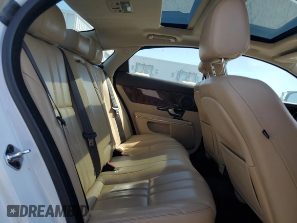 2013 Jaguar XJ with VIN SAJWA1C79D8V51400, listed as a Copart auction lot 54972475 with 79,471 mi miles and Clean Title. Bid and sale history available at DreamBid. Image 10.