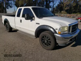 2002 Ford F-250 XL with VIN 1FTNX20L32ED10043, listed as a Copart auction lot 82608574 with 150,324 mi miles and Salvage title. Bid and sale history available at DreamBid. Image 4.