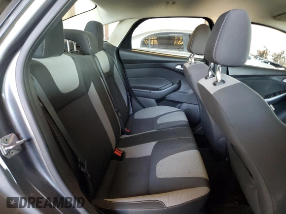2012 Ford Focus SE with VIN 1FAHP3F28CL114572, listed as a Copart auction lot 63053035 with 142,994 mi miles and Salvage title. Bid and sale history available at DreamBid. Image 10.