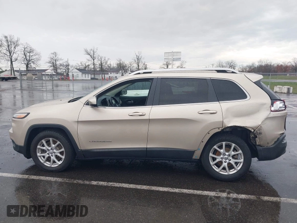 2014 Jeep Cherokee Latitude with VIN 1C4PJLCB8EW191911, listed as a IAAI auction lot 41956728 with 123,643 mi miles. Bid and sale history available at carsss.com. Image 14.