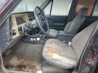 1993 Jeep Cherokee Sport with VIN 1J4FJ68S6PL506709, listed as a Copart auction lot 86638434 with 253,923 mi miles and Salvage Title. Bid and sale history available at carsss.com. Image 7.