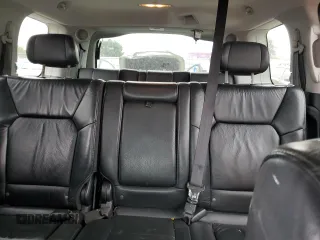 2011 Honda Pilot Touring z VIN 5FNYF3H92BB039165, wystawiony jako Copart lot #59596105 z przebiegiem 182 944 mil mil oraz Szkoda całkowita • Salvage title. Historia ofert i sprzedaży dostępna na DreamBid. Obrazek 10.