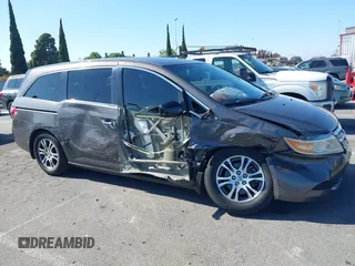 2011 Honda Odyssey EX-L with VIN 5FNRL5H68BB083492, listed as a IAAI auction lot 42087699 with 155,141 mi miles and . Bid and sale history available at carsss.com. Image 13.