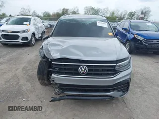 2022 Volkswagen Tiguan SE R-Line Black с VIN 3VVCB7AX1NM065960, выставлен на аукционе IAAI как лот 42149626 с пробегом 71 698 миль миль и . История ставок и продаж доступна на DreamBid. Изображение 12.