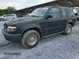 2000 Ford Explorer Sport with VIN 1FMYU60E8YUB03494, listed as a Copart auction lot 59266395 with 210,925 mi miles and Salvage title. Bid and sale history available at DreamBid. Image 1.