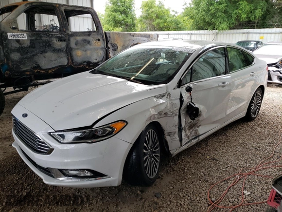 2018 Ford Fusion Hybrid Titanium with VIN 3FA6P0RU7JR128562, listed as a Copart auction lot 49174533 with 64,928 mi miles. Bid and sale history available at carsss.com. Image 1.