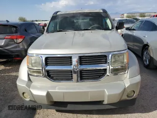 2009 Dodge Nitro SE z VIN 1D8GT28K29W504908, wystawiony jako Copart lot #75272154 z przebiegiem 156 571 mil mil oraz Szkoda całkowita • Salvage title. Historia ofert i sprzedaży dostępna na DreamBid. Obrazek 5.