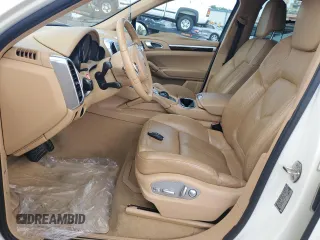 2012 Porsche Cayenne with VIN WP1AA2A23CLA02615, listed as a Copart auction lot 64604655 with 131,536 mi miles and Salvage title. Bid and sale history available at DreamBid. Image 7.