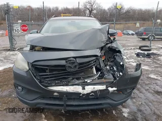 2015 Mazda CX-9 Grand Touring with VIN JM3TB2DAXF0447537, listed as a IAAI auction lot 41191694 with 157,113 mi miles. Bid and sale history available at carsss.com. Image 12.