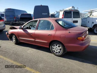2000 Hyundai Elantra GLS z VIN KMHJF35F9YU919481, wystawiony jako Copart lot #79717924 z przebiegiem 137 918 mil mil oraz Szkoda całkowita • Salvage title. Historia ofert i sprzedaży dostępna na DreamBid. Obrazek 2.