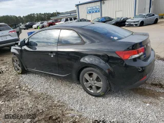 2010 Kia Forte Koup EX with VIN KNAFU6A20A5153190, listed as a Copart auction lot 50558145 with 164,077 mi miles and Salvage Title. Bid and sale history available at carsss.com. Image 2.