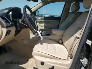 2015 Jeep Grand Cherokee High Altitude with VIN 1C4RJECGXFC906464, listed as a Copart auction lot 49657955 with 125,239 mi miles and Salvage Title. Bid and sale history available at carsss.com. Image 7.