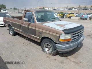 1992 Ford F-150 with VIN 1FTEF15N4NLA04945, listed as a IAAI auction lot 42605716 with 262,058 mi miles and . Bid and sale history available at DreamBid. Image 1.