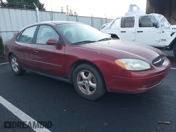 2002 Ford Taurus SE Standard z VIN 1FAFP53U32G242170, wystawiony jako IAAI lot #41299039 z przebiegiem 99 928 mil mil oraz . Historia ofert i sprzedaży dostępna na DreamBid. Obrazek 1.