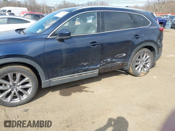 2021 Mazda CX-9 Grand Touring with VIN JM3TCBDY7M0540359, listed as a IAAI auction lot 41711366 with 47,391 mi miles and . Bid and sale history available at carsss.com. Image 6.