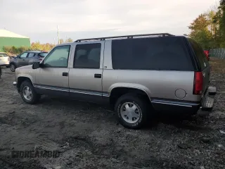 1999 GMC Suburban z VIN 3GKEC16R4XG536985, wystawiony jako Copart lot #73421824 z przebiegiem 181 327 mil mil oraz Tytuł czysty. Historia ofert i sprzedaży dostępna na DreamBid. Obrazek 2.