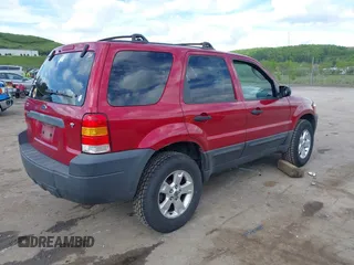 2006 Ford Escape XLT with VIN 1FMYU93156KA02013, listed as a IAAI auction lot 42205647 with 182,974 mi miles and . Bid and sale history available at DreamBid. Image 4.
