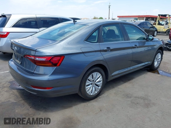 2019 Volkswagen Jetta S z VIN 3VWC57BU0KM223143, wystawiony jako IAAI lot #42605872 z przebiegiem 144 245 mil mil oraz . Historia ofert i sprzedaży dostępna na DreamBid. Obrazek 4.