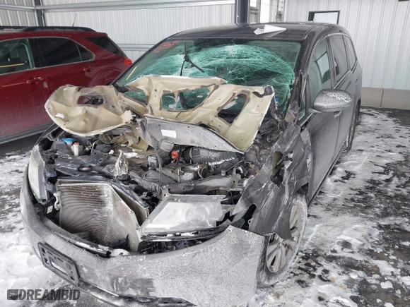 2016 Honda Odyssey SE with VIN 5FNRL5H32GB155946, listed as a IAAI auction lot 41590237 with 140,167 mi miles. Bid and sale history available at carsss.com. Image 6.