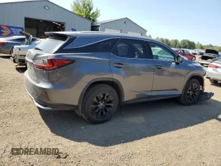 2021 Lexus RX with VIN JTJHZKFA1M2031902, listed as a Copart auction lot 67645974 with 72,192 mi miles and Salvage Title. Bid and sale history available at carsss.com. Image 3.