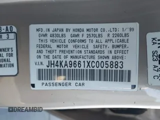 1999 Acura RL with VIN JH4KA9661XC005883, listed as a IAAI auction lot 40560595 with 165,195 mi miles. Bid and sale history available at carsss.com. Image 9.